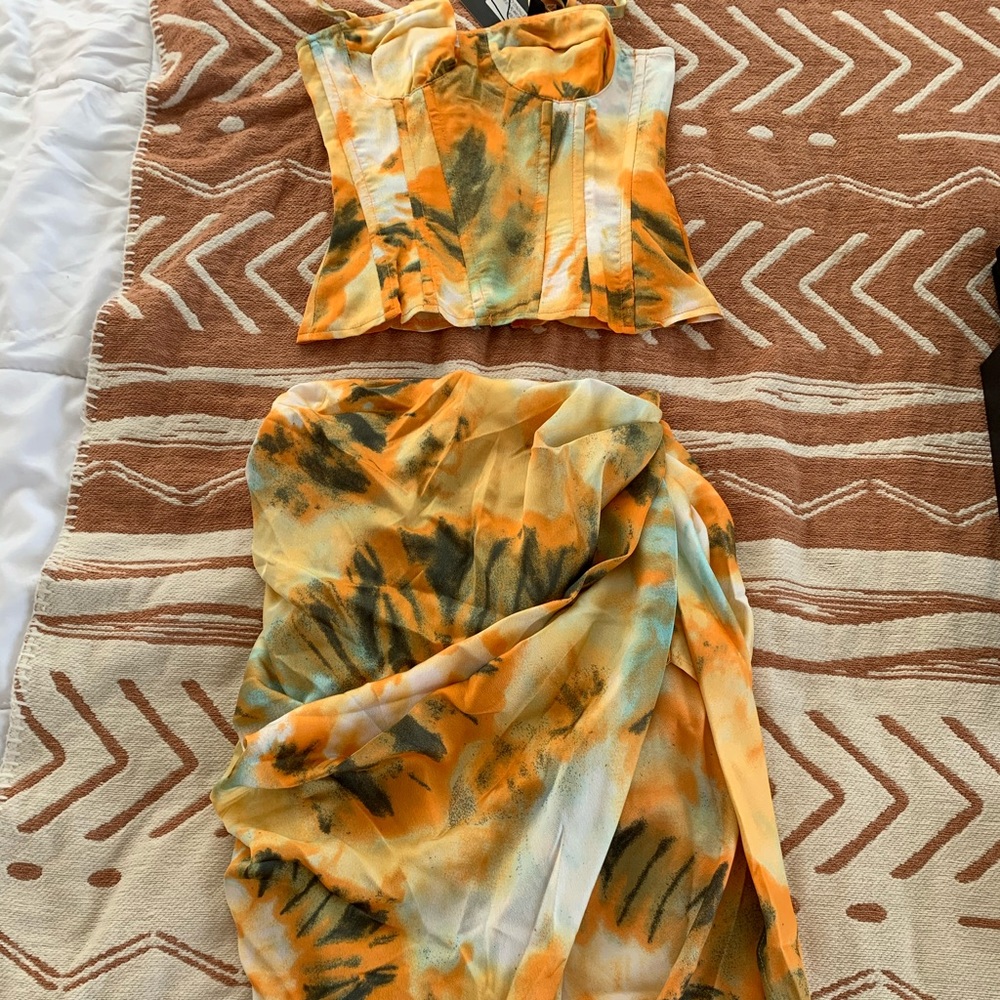 BRAND NEW! Corset top with matching slit skirt.